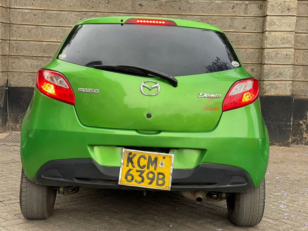 Used cars under 700k Kenya - Green Mazda Demio 2010